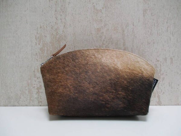 Koeienhuid toilettas cognac/zwart/wit