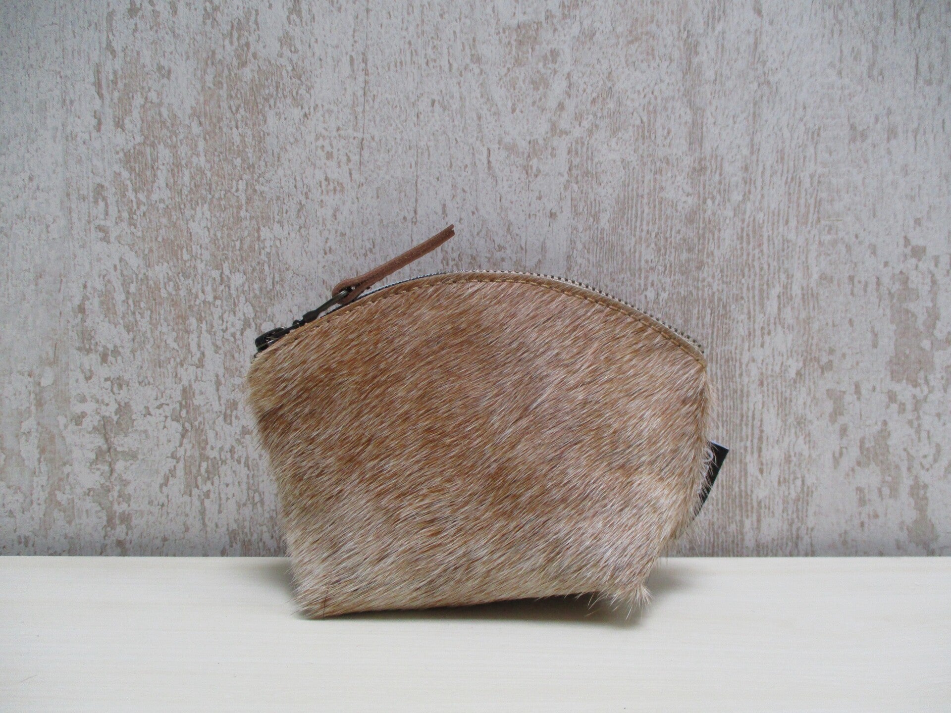 Koeienhuid make-up tasje cognac/beige