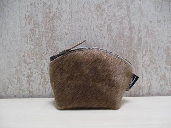 Koeienhuid make-up tasje taupe