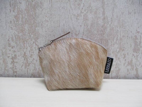 Koeienhuid make-up tasje beige/wit