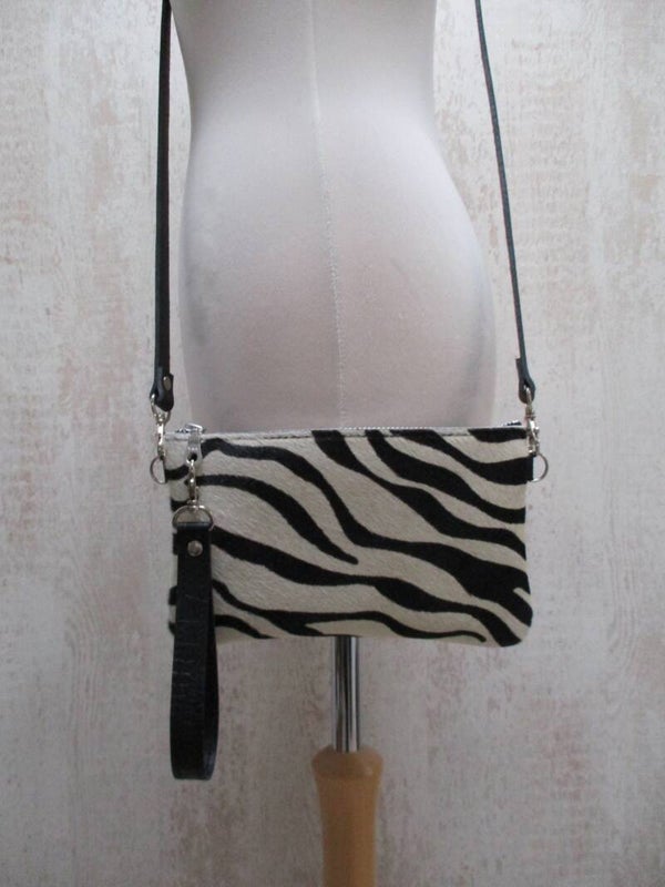 Leren schoudertas en clutch zebra