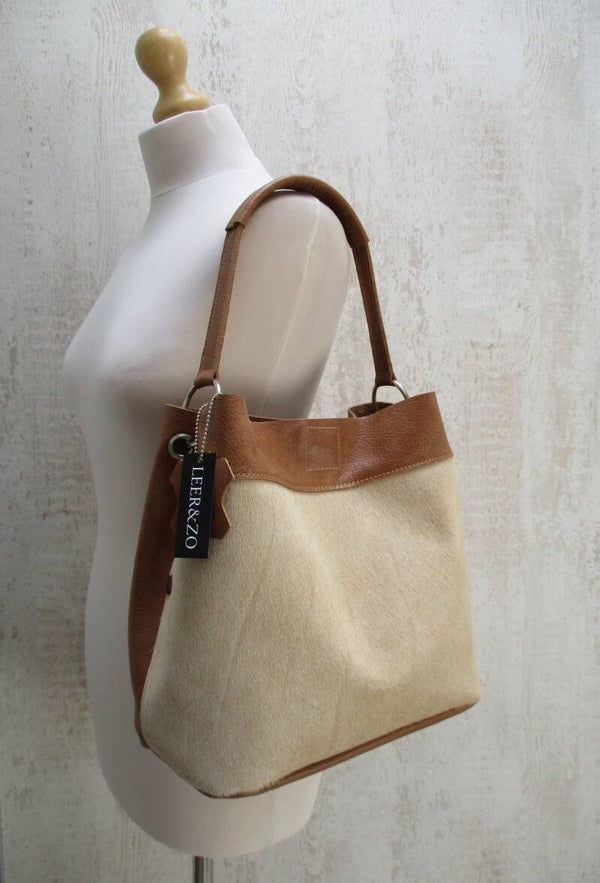 Cognac leren buideltas koeienhuid beige