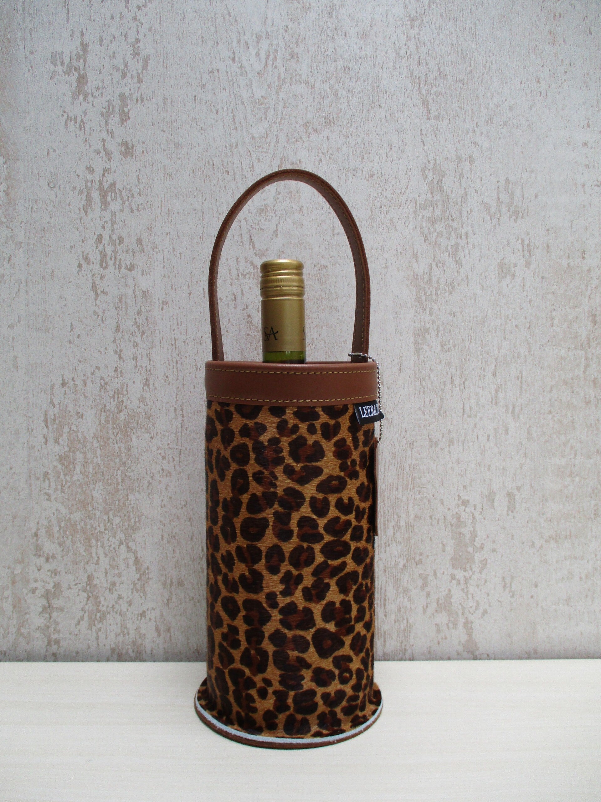 Wijnkoeler koeienhuid luipaard/cognac