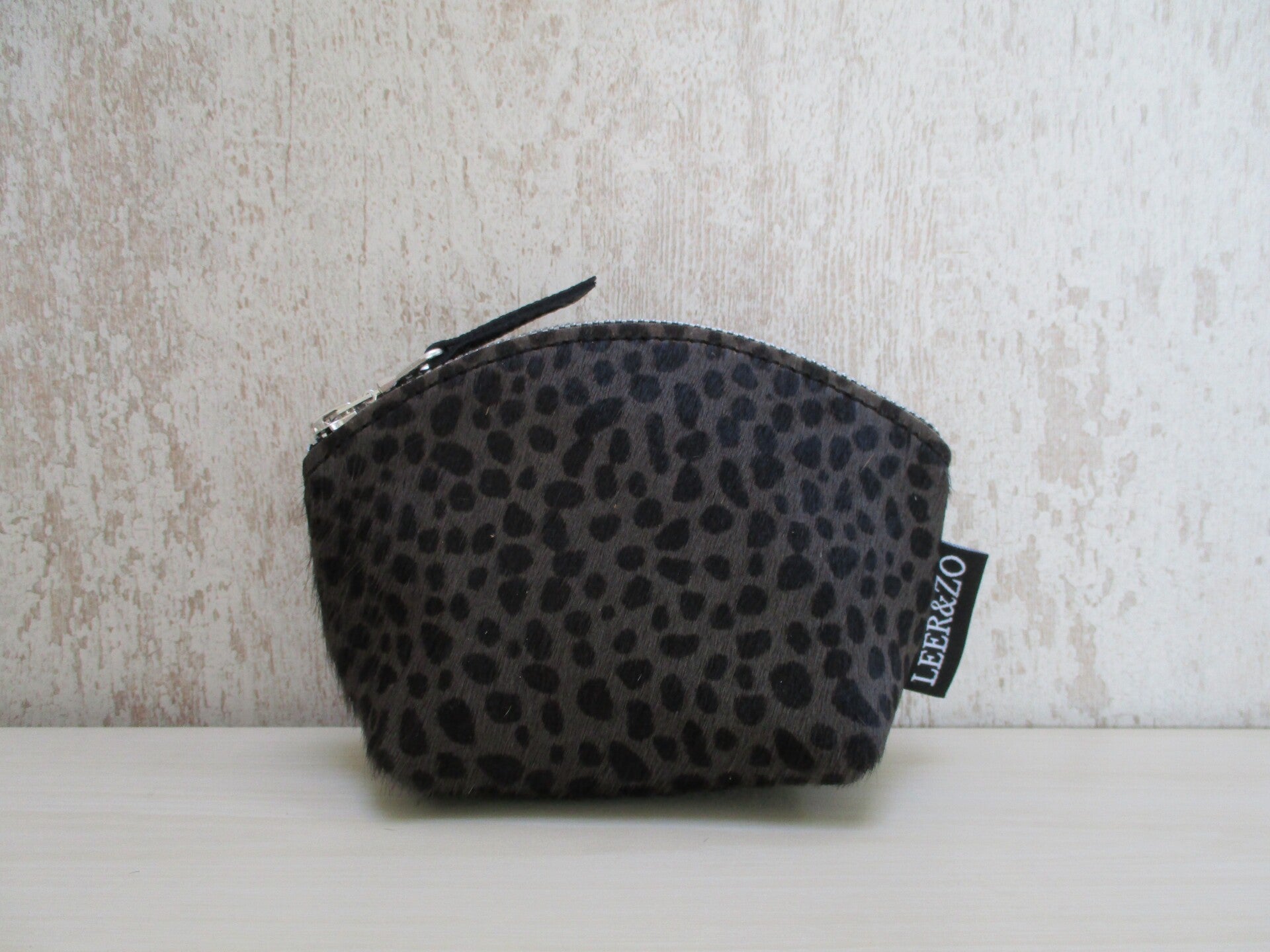 Koeienhuid make-up tasje cheetah/black