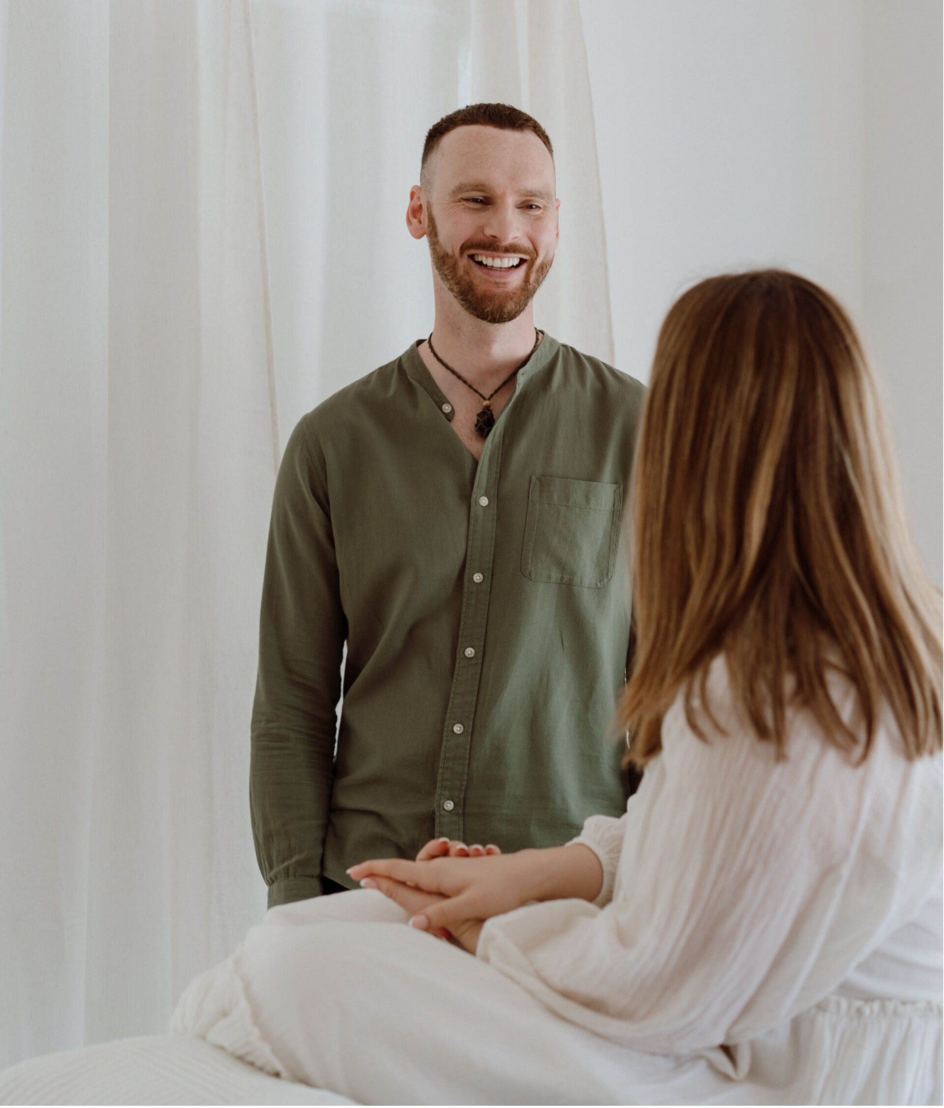 Practitioner welcoming a client before a Reiki and Seichem energy healing session