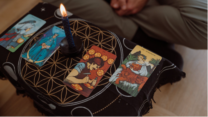 Tarot cards laid out during a reading session with photo provided after the reading