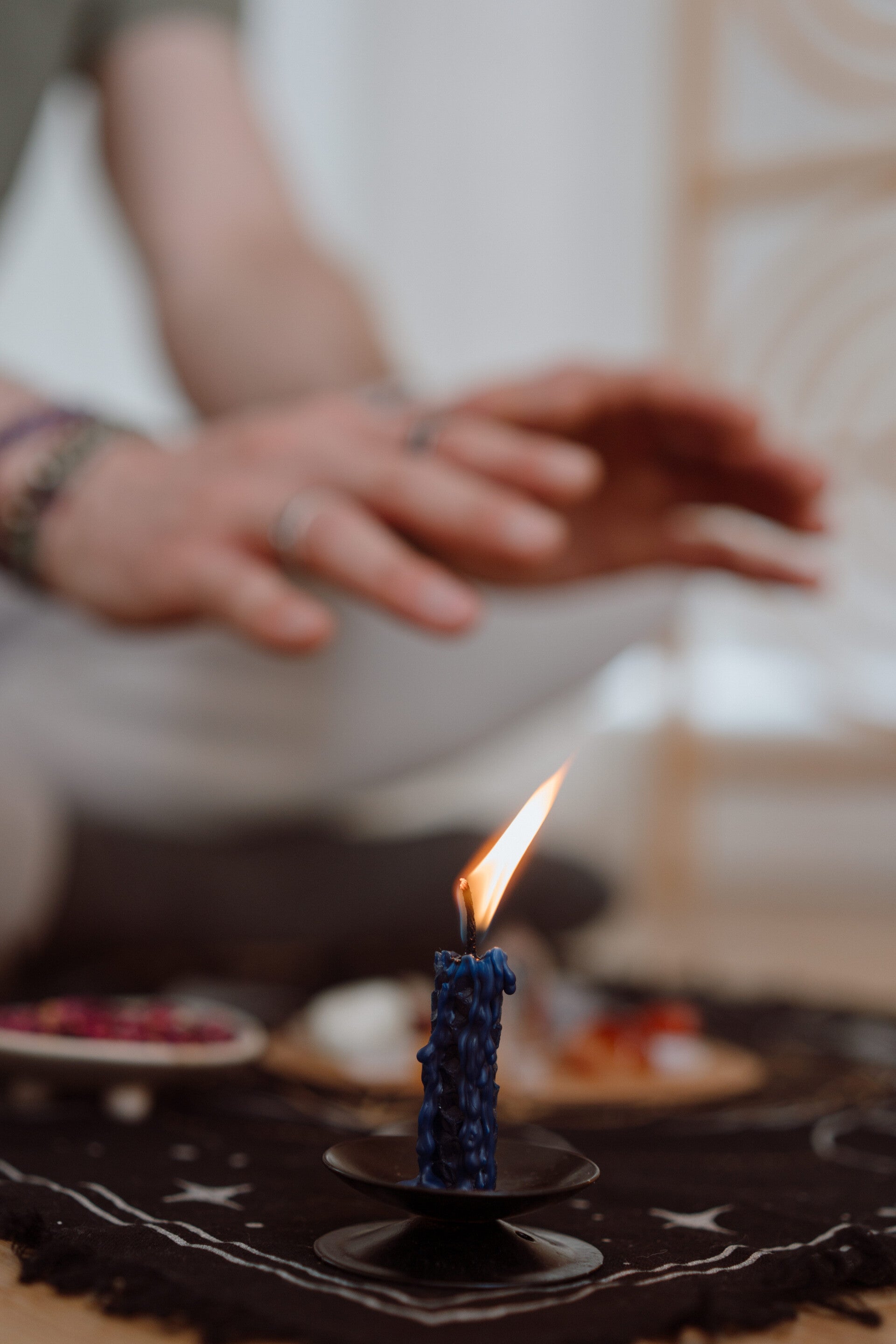 Hands positioned for online Reiki and Seichem energy healing during an online sessio
