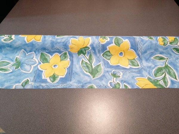 Tafelzeil blauw met gele bloemen
