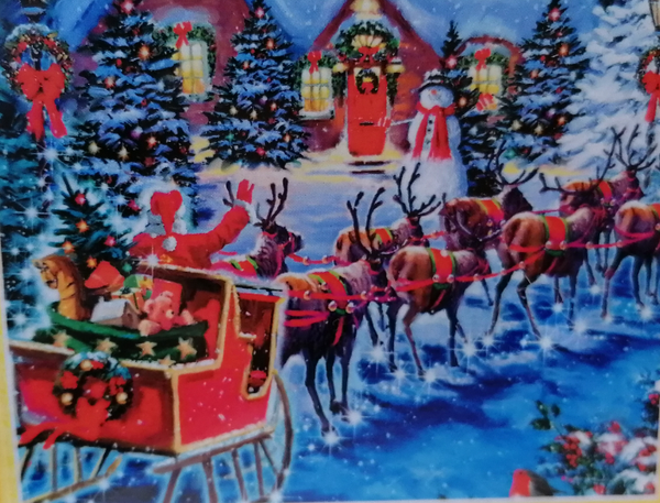 Kerstman met rendieren