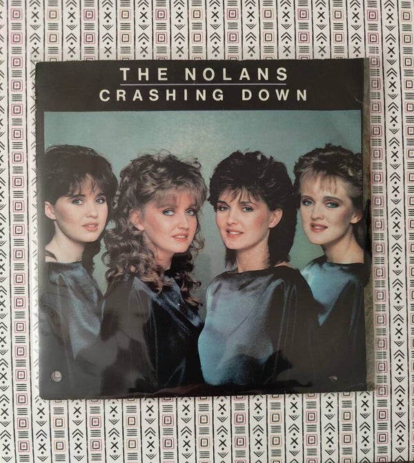 The Nolans - Crashing down