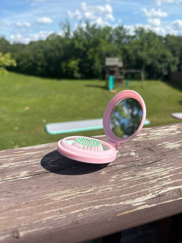 Pink hairbrush mirror
