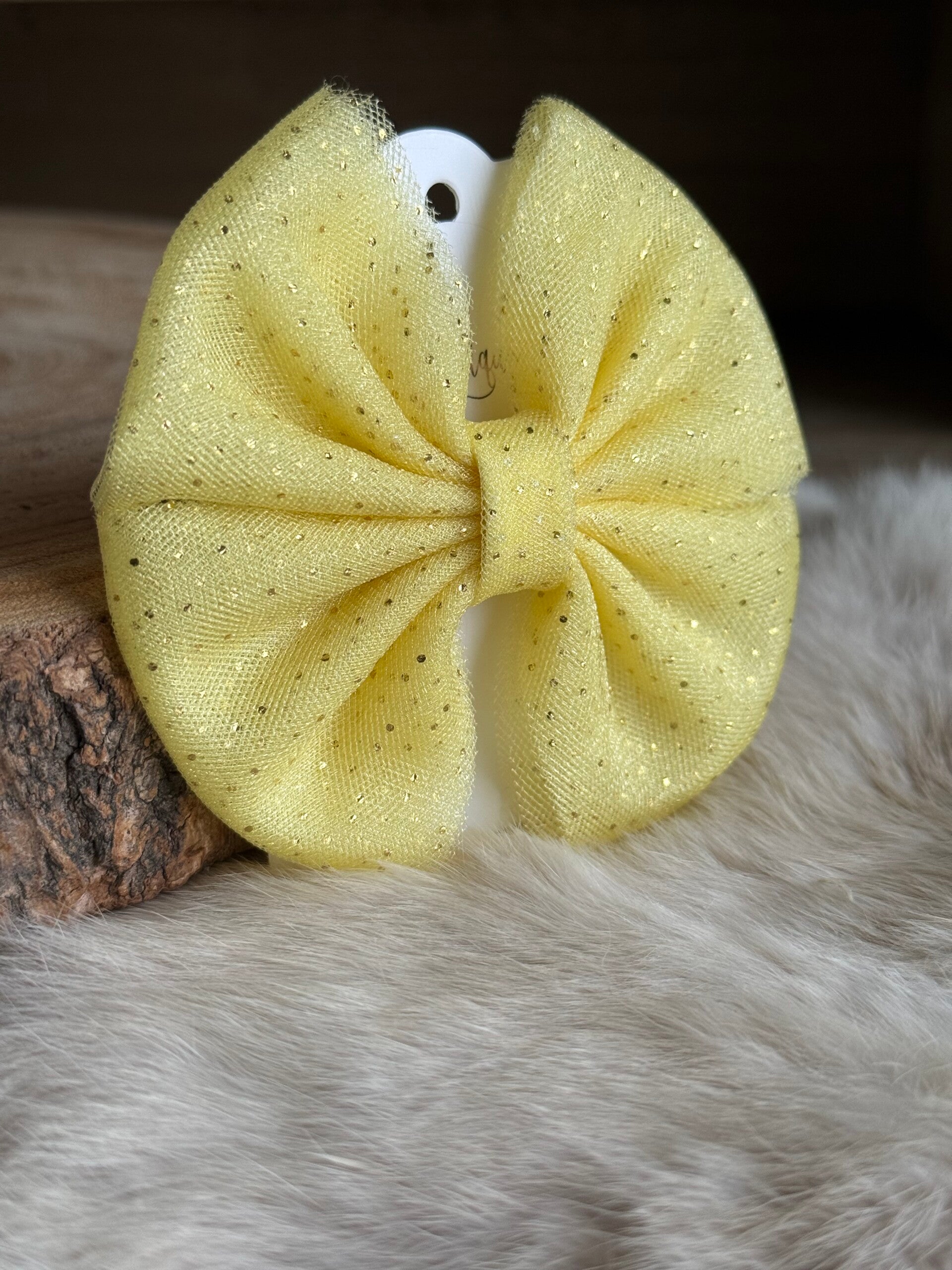 Tulle strik stipjes Geel