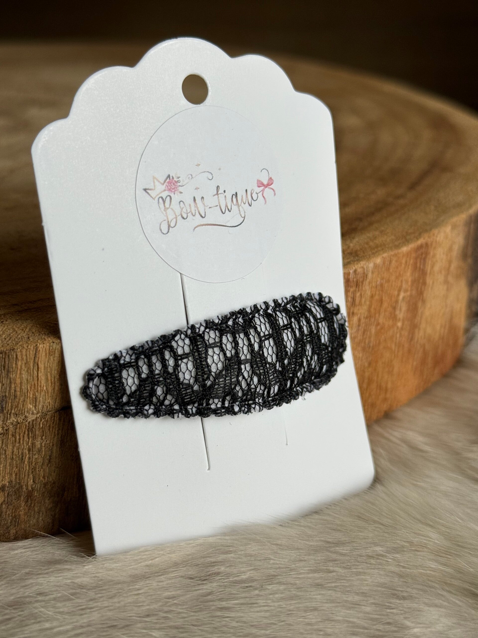 Klikklakspeldje Kant Zwart