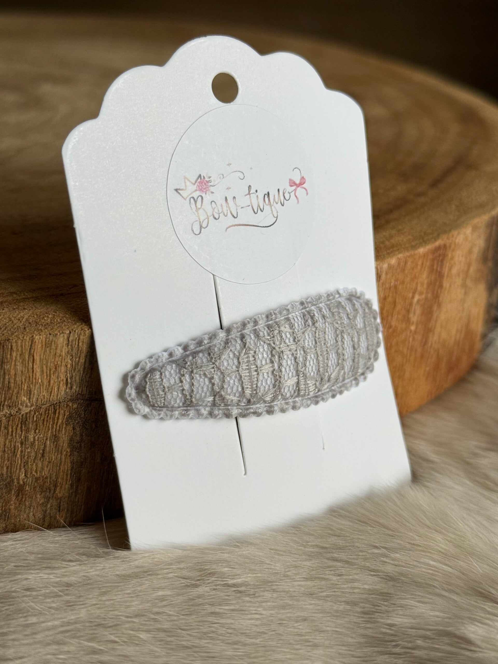 Klikklakspeldje Kant Grijs