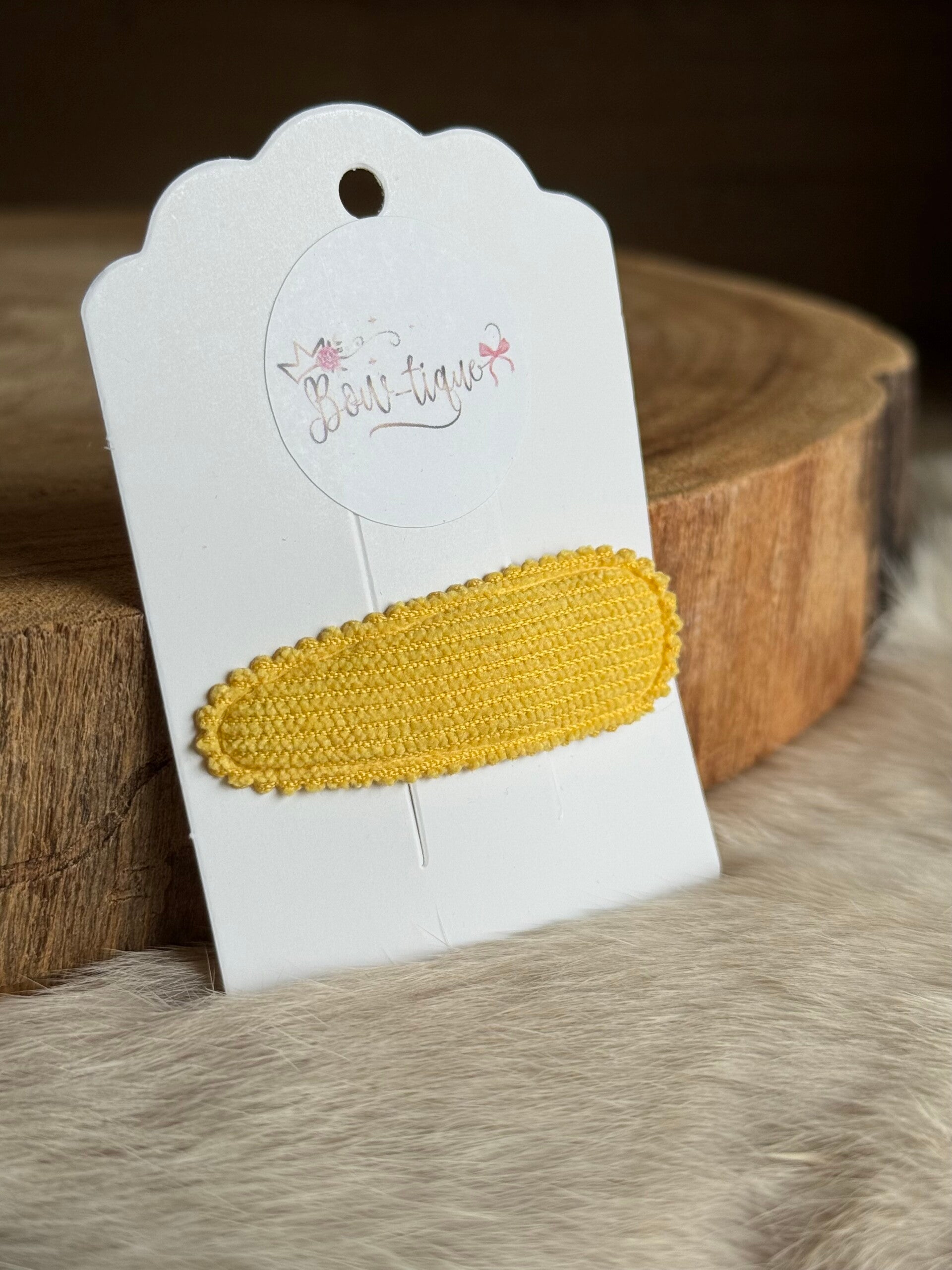 Klikklakspeldje geribbeld Geel