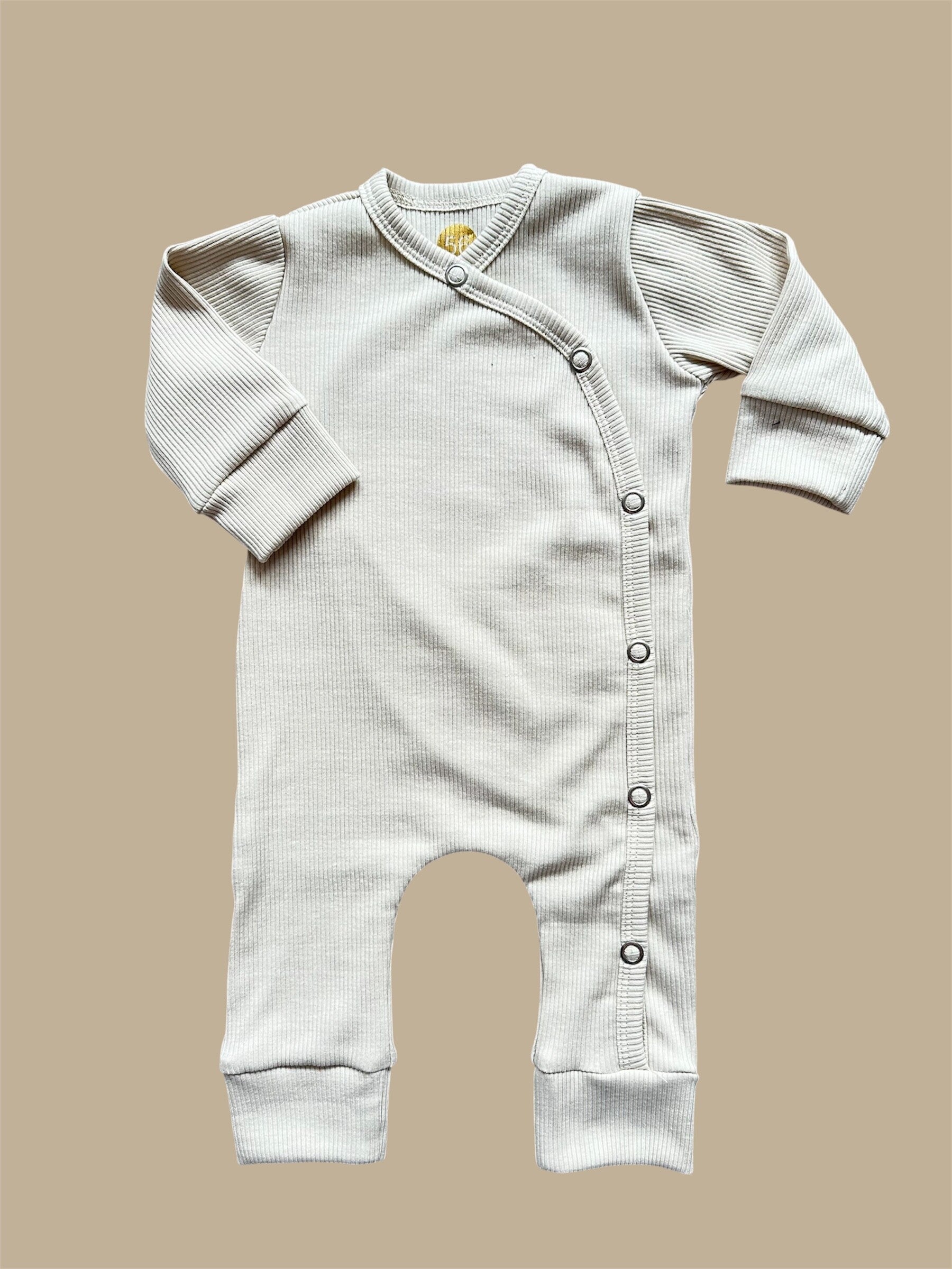 Unisex boxpakje beige