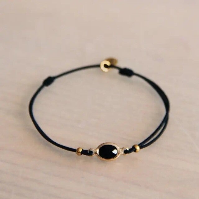 Armband met kristalsteen — zwart/goud