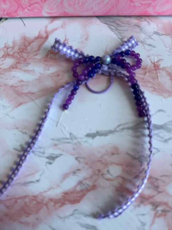 Purple beaded bow charm
