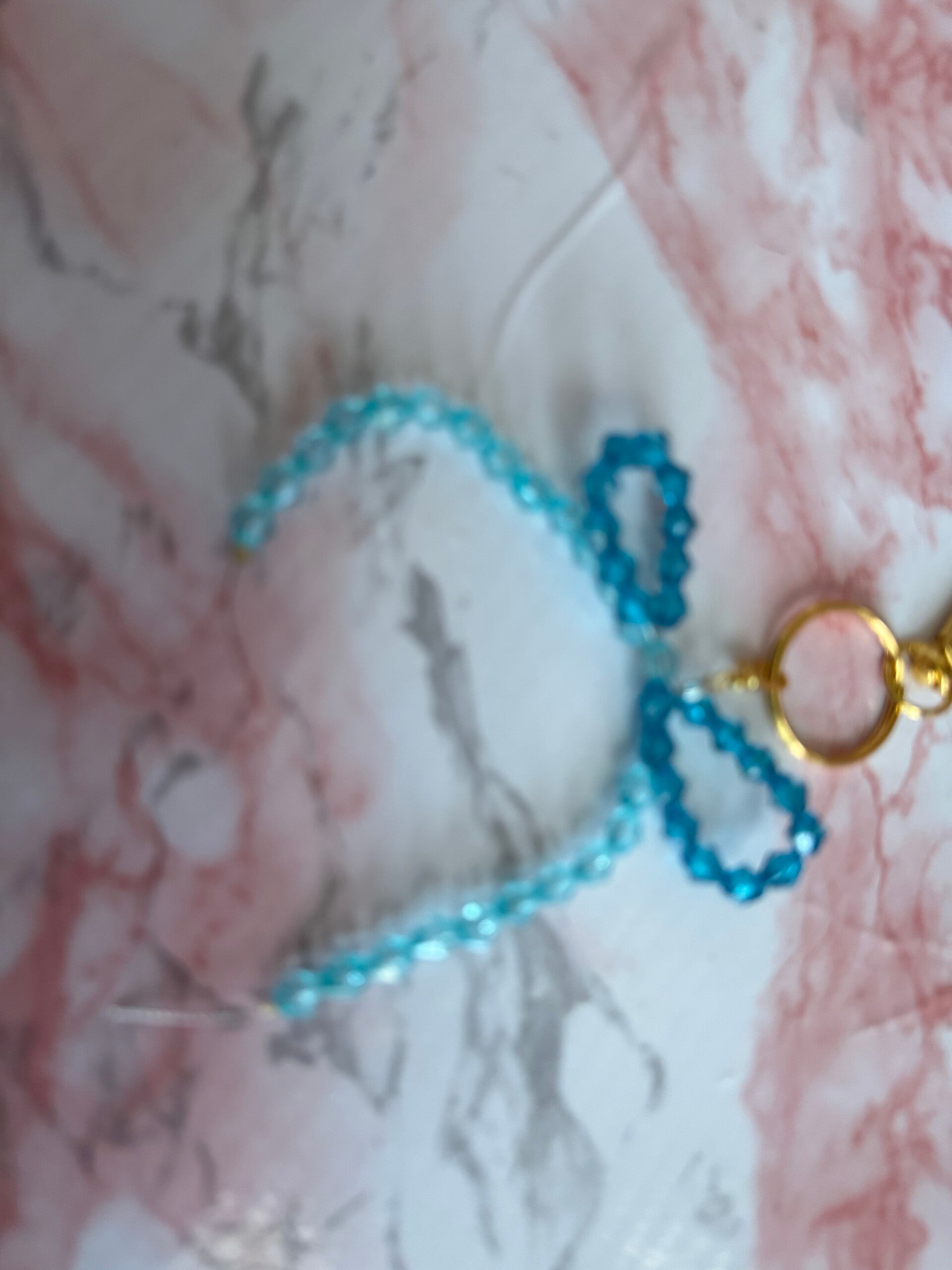 Blue beaded bow charm