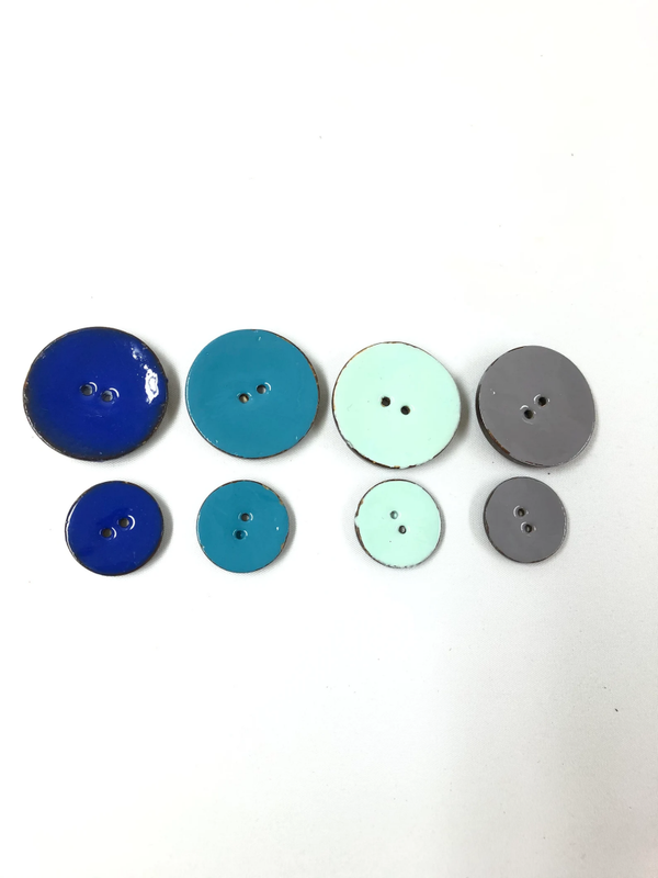 Geglazuurde kokos knopen in blauw en grijs tinten