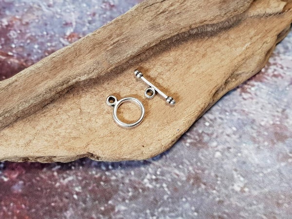 01. T en O slot 1.5cm Ziverkleurig