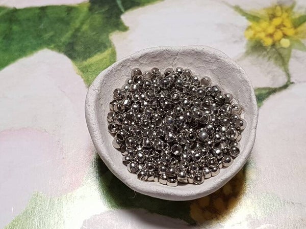 Knijpkralen 1,2mm oud zilverkleurig