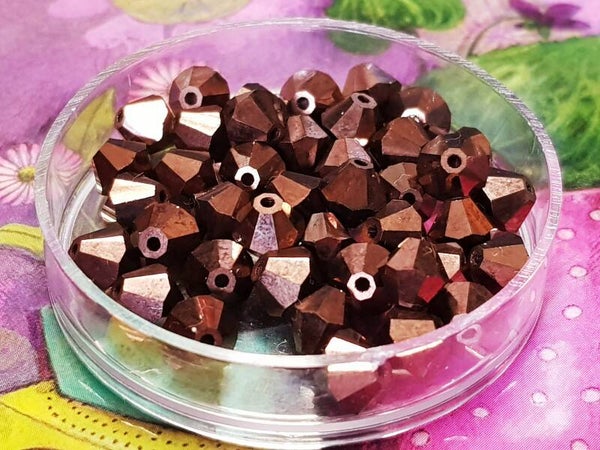 Swarovski Toupies Met Copper 6mm/ 21st