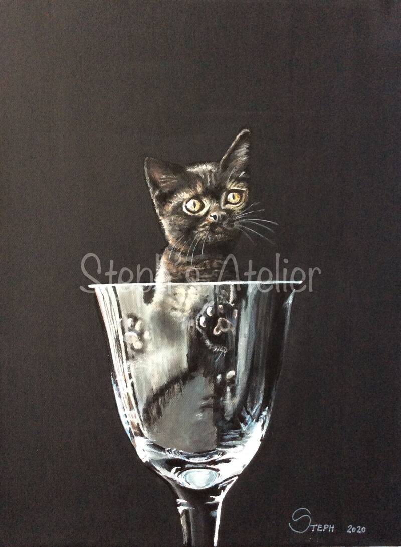 Kitten in een glas