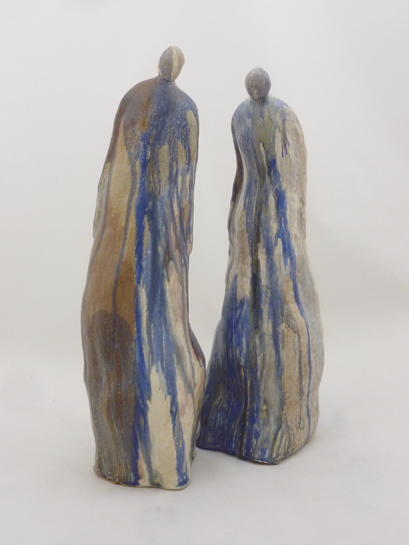 vrouw 1, 2, hoogte 52 en 53 cm