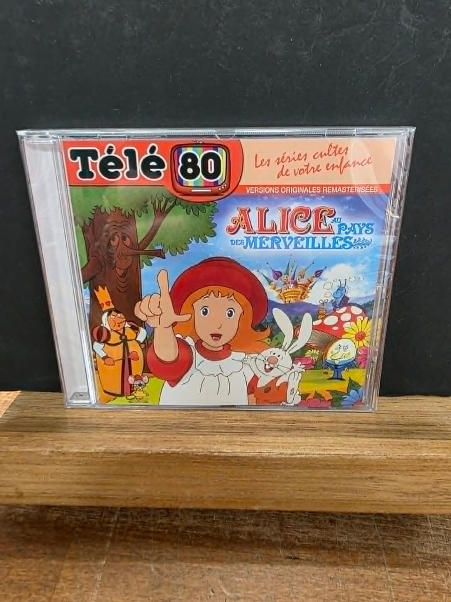 TELE 80 - LES SERIES CULTES DE VOTRE ENFANCE - ALICE AU PAYS DES MERVEILLES - NEUF SOUS CELLO