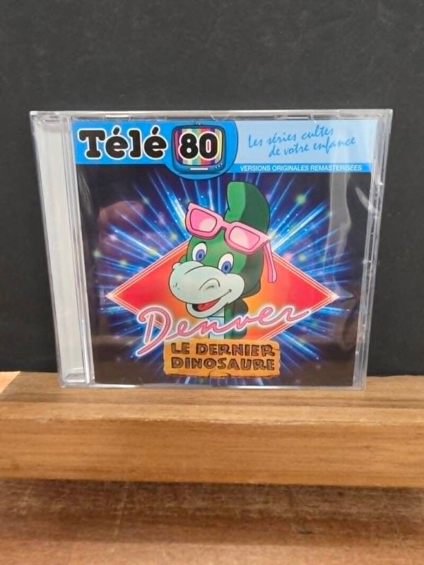 TELE 80 - LES SERIES CULTES DE VOTRE ENFANCE - DENVER LE DERNIER DINOSAURE - NEUF SOUS CELLO