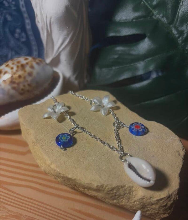 Cowrie shell w/ flowers and glass beads