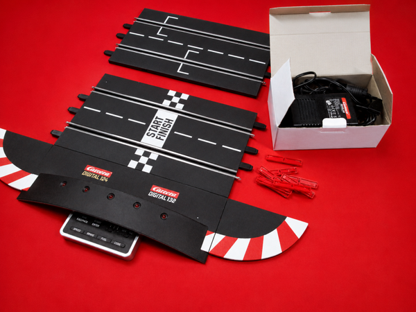 Carrera Digital 132 Control Unit + Trafo + Startaufstellung + Randstreifenendstücke