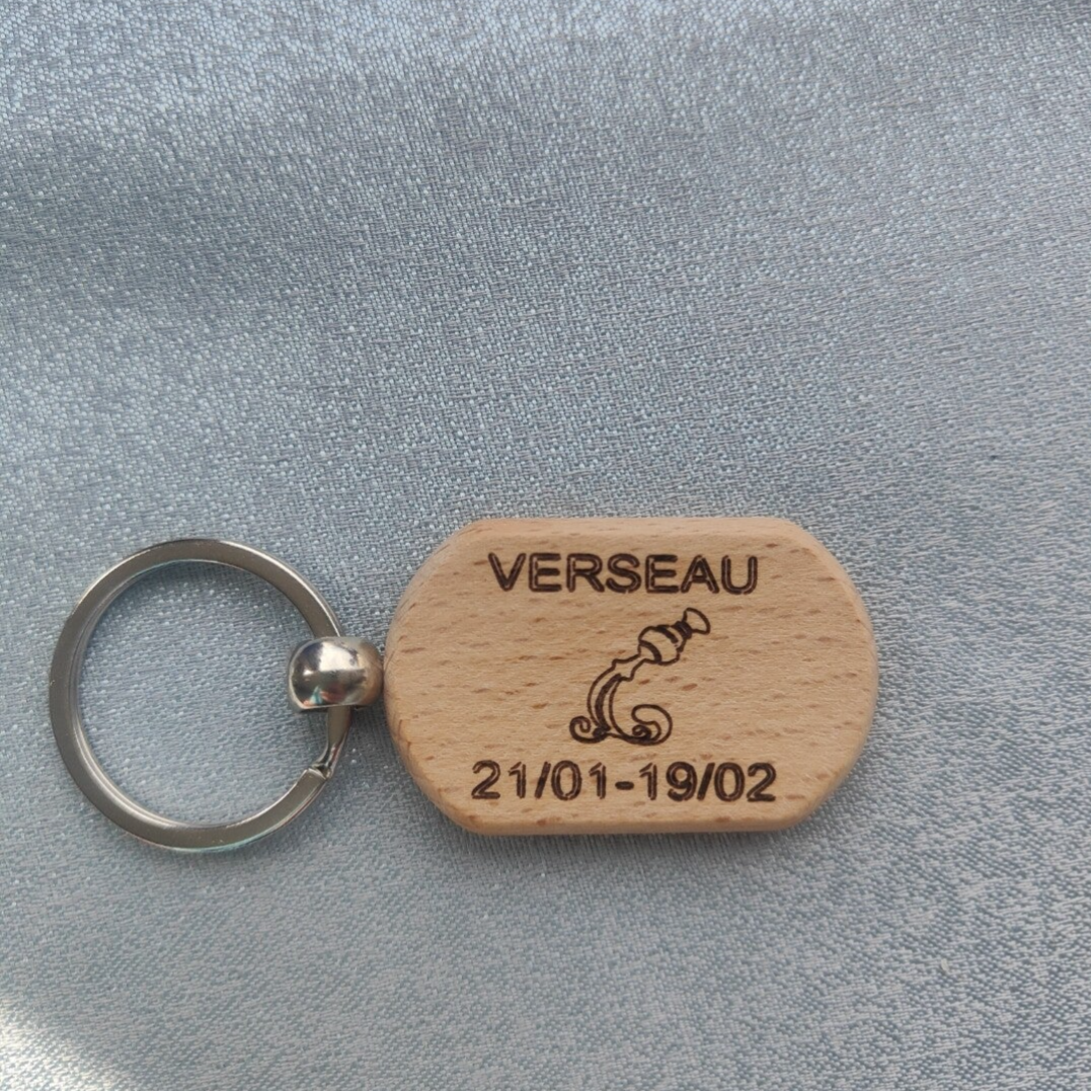 Porte clé astro ovale