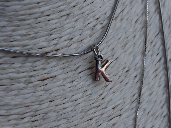 Alfabetbedel zilver ketting