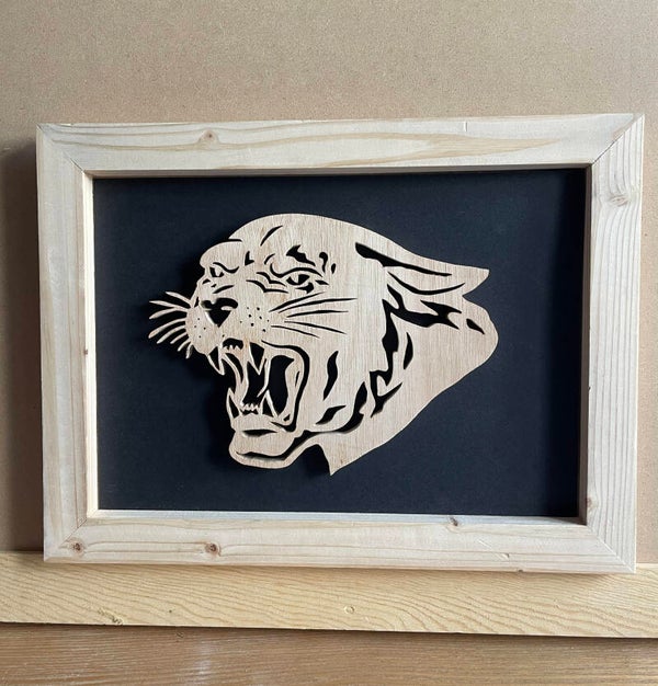 Chantournage sur bois - modèle jaguar- Réalisé par Loulou