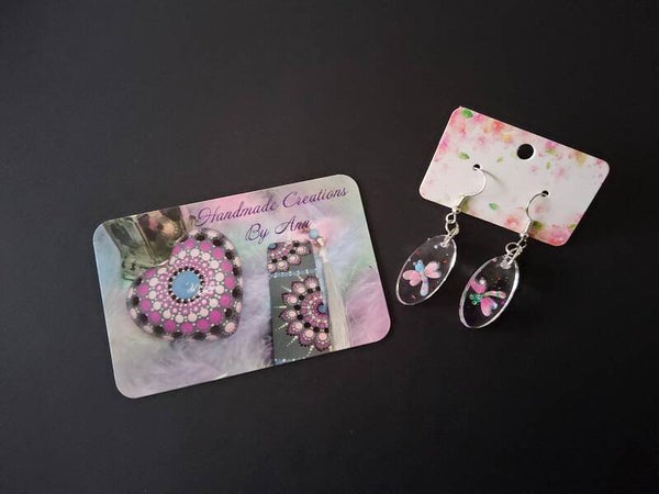 Uniek setje oorbellen met een libelletje in .