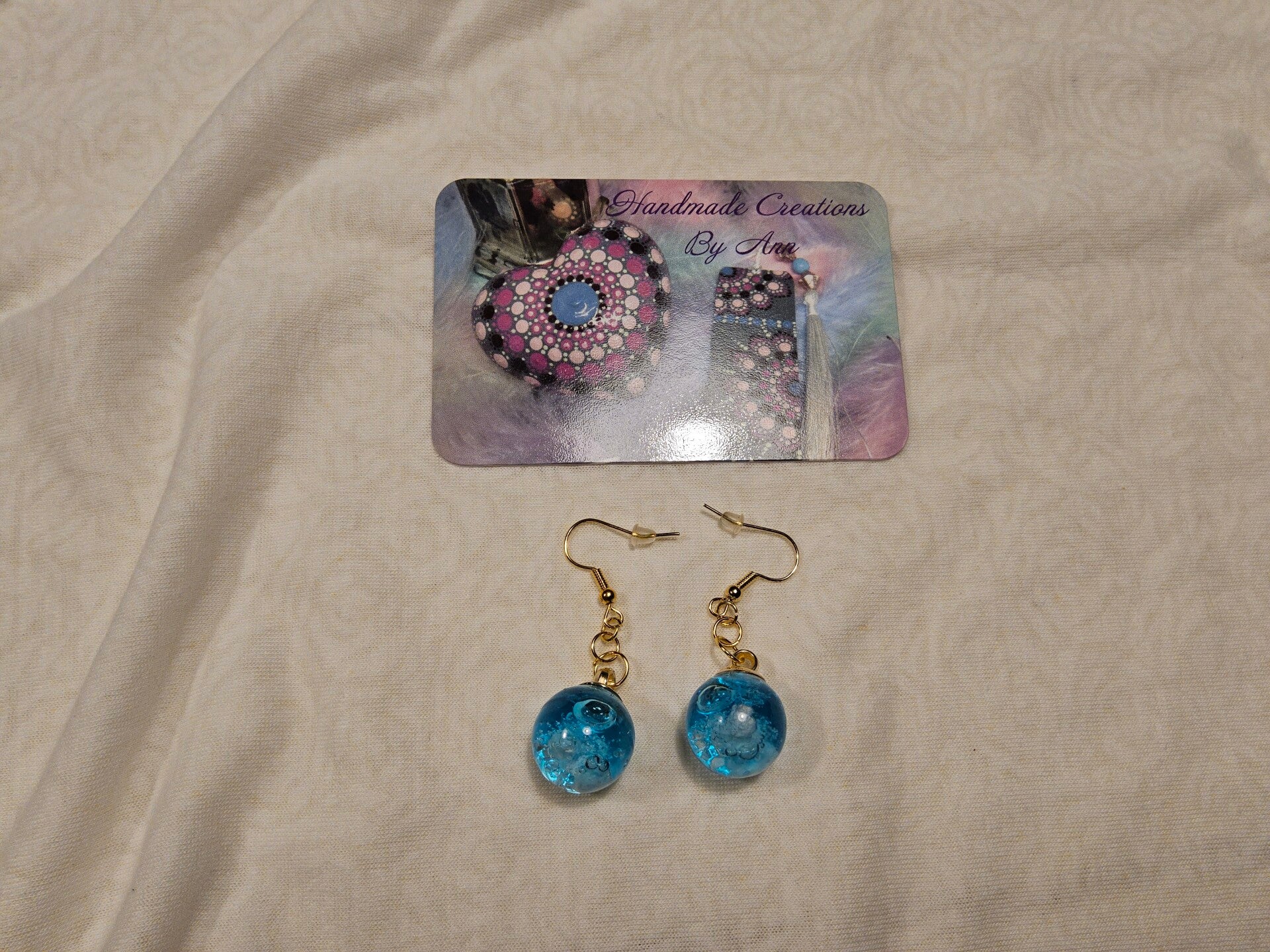 Uniek setje oorbellen met wolkjes in .