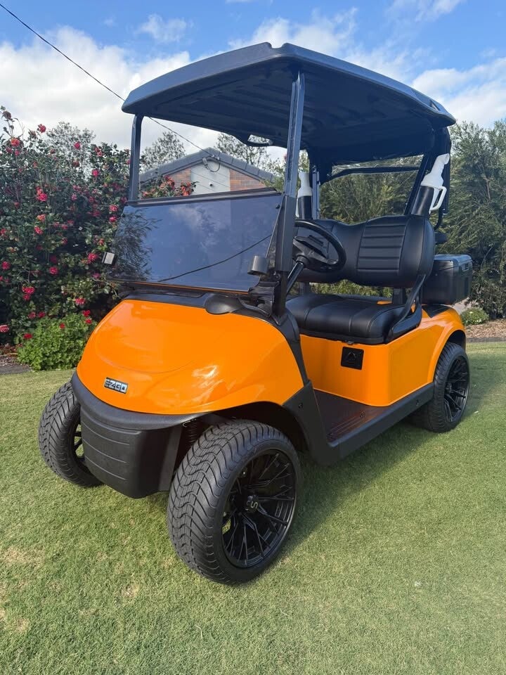 SOLD **Orange Fury** 2021 EZGO RXV Lithium Elite 2 Passenger Electric Golf Cart