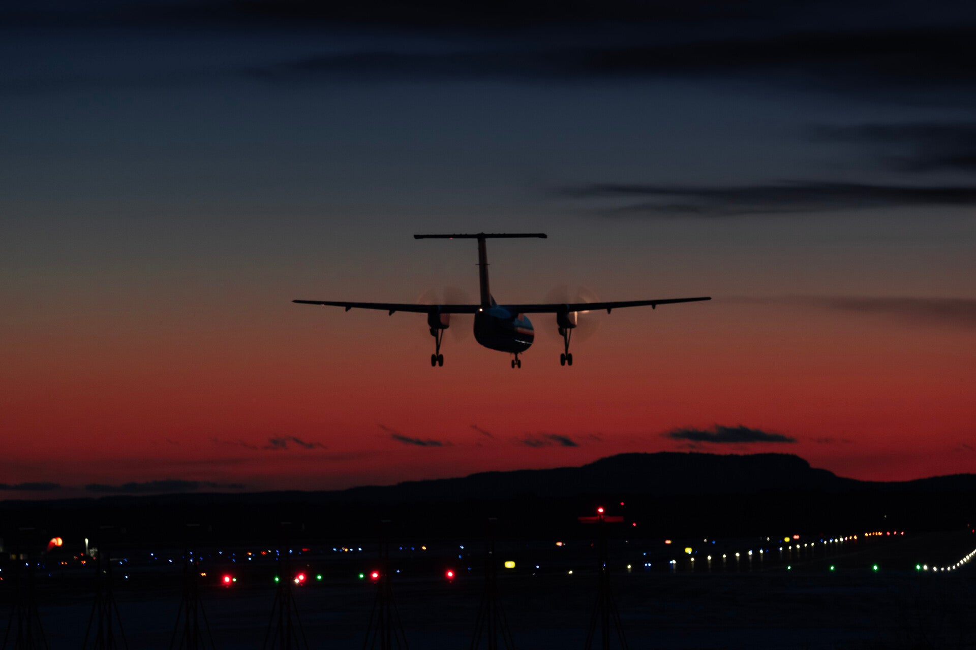 Dash 8 sunset silhouette
