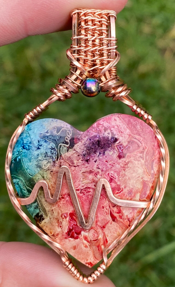 Heartbeat Palm Root Pendant.