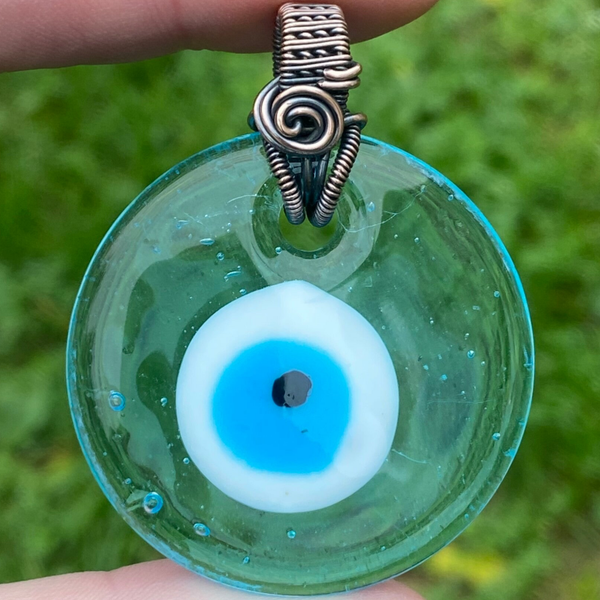 The Witch’s Eye 🧿Translucent Blue Evil Eye Pendant