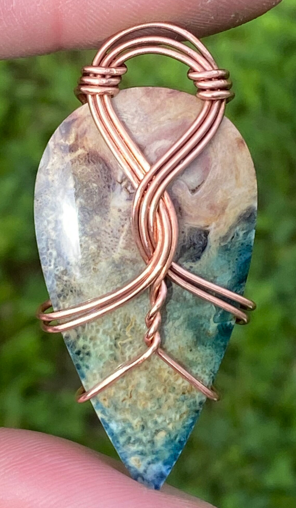 Dyed Palm Root Celtic Flow Pendant.