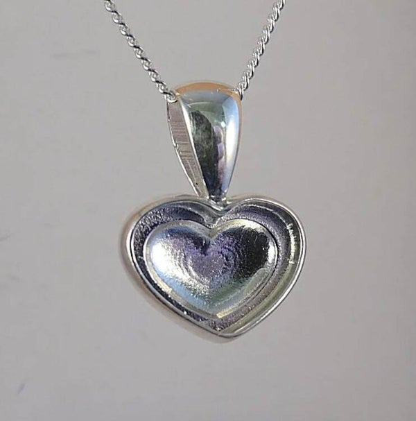 Solid silver heart shaped pendant