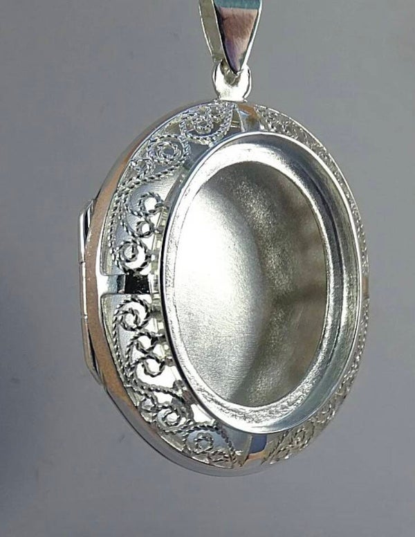 Solid silver filigree locket