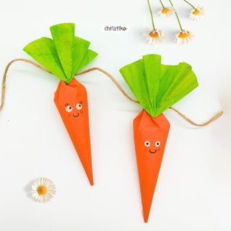 Karotten basteln aus Kaffeefiltern und Muffinformen bemalen Osteridee Osterbastelei mit Kindern Girlande Bastelidee Ostern Karotte DIY Christlko Christine Kohl Tischdeko Ostertisch orange kreative Osterzeit einfache und schnelle Idee Watte