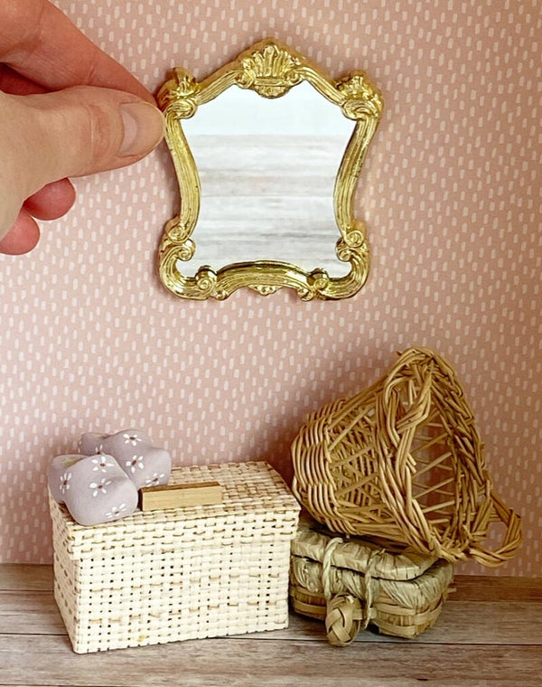 Spiegel met gouden lijst