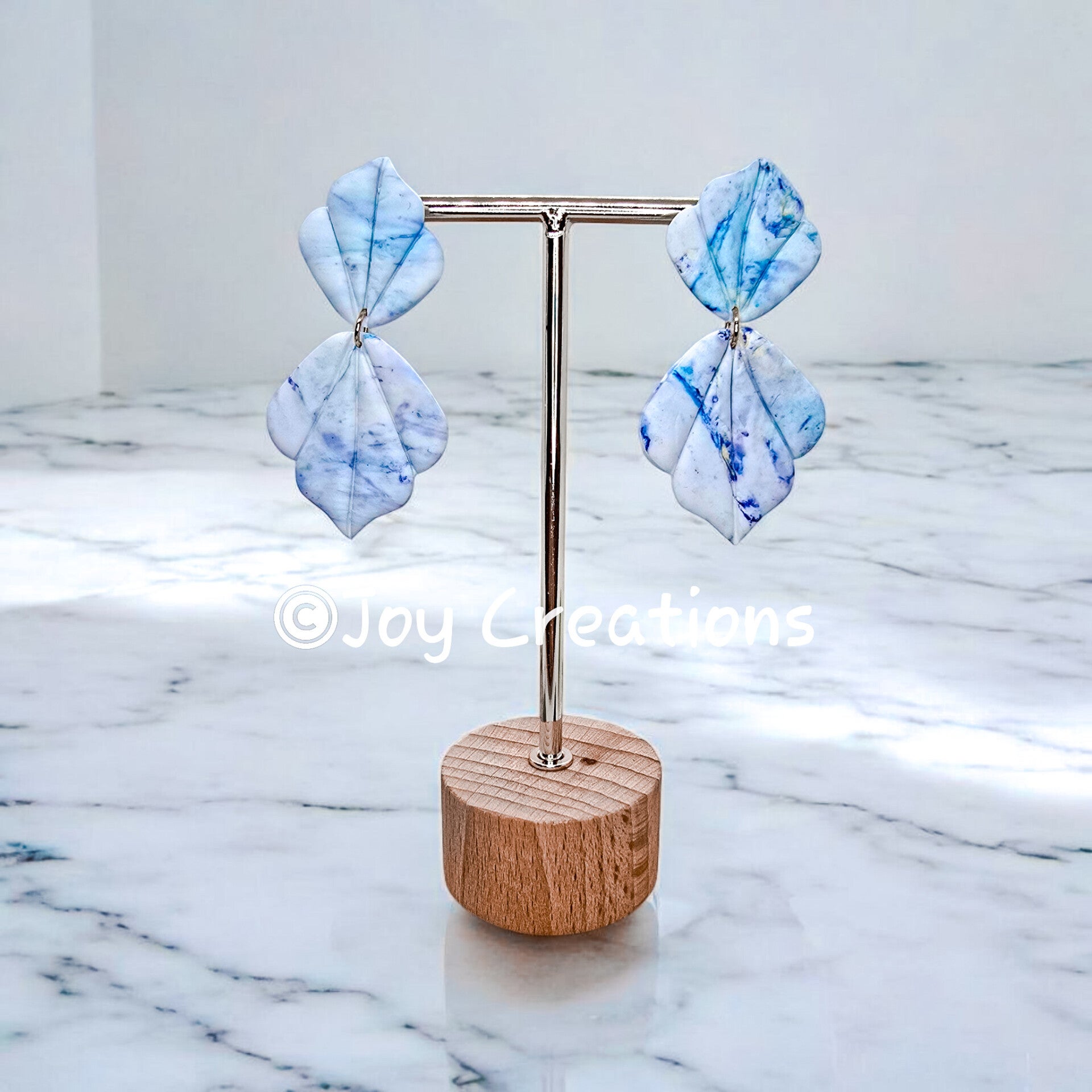 Oorbellen hangers Dubble leaf marmer blauw