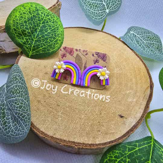 Oorbellen studs Mini regenboog 1 bloem