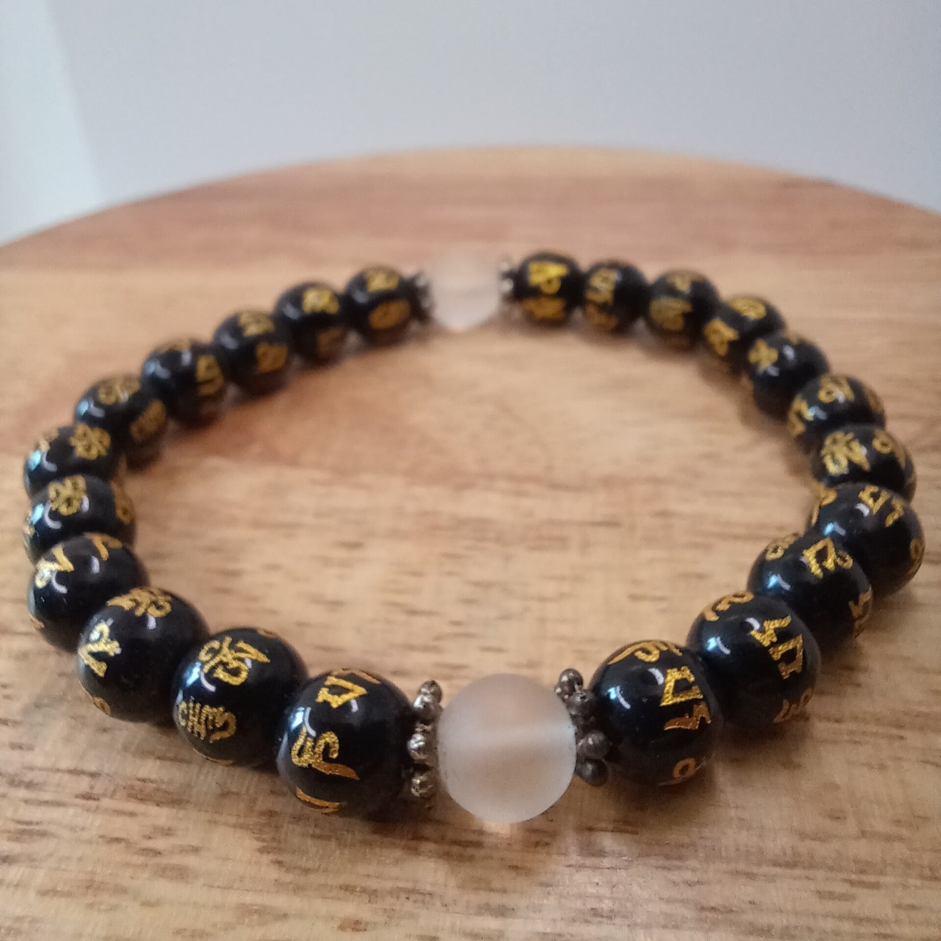 Bracelet Obsidienne noire - gravé mantra Om & cristal de roche mat 8 mm
